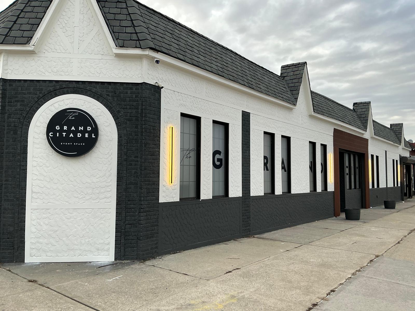 A beautiful wedding reception setup in a grand hall.